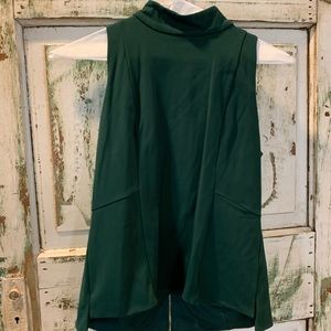 White House  Black Market Green top/shell. Size 6